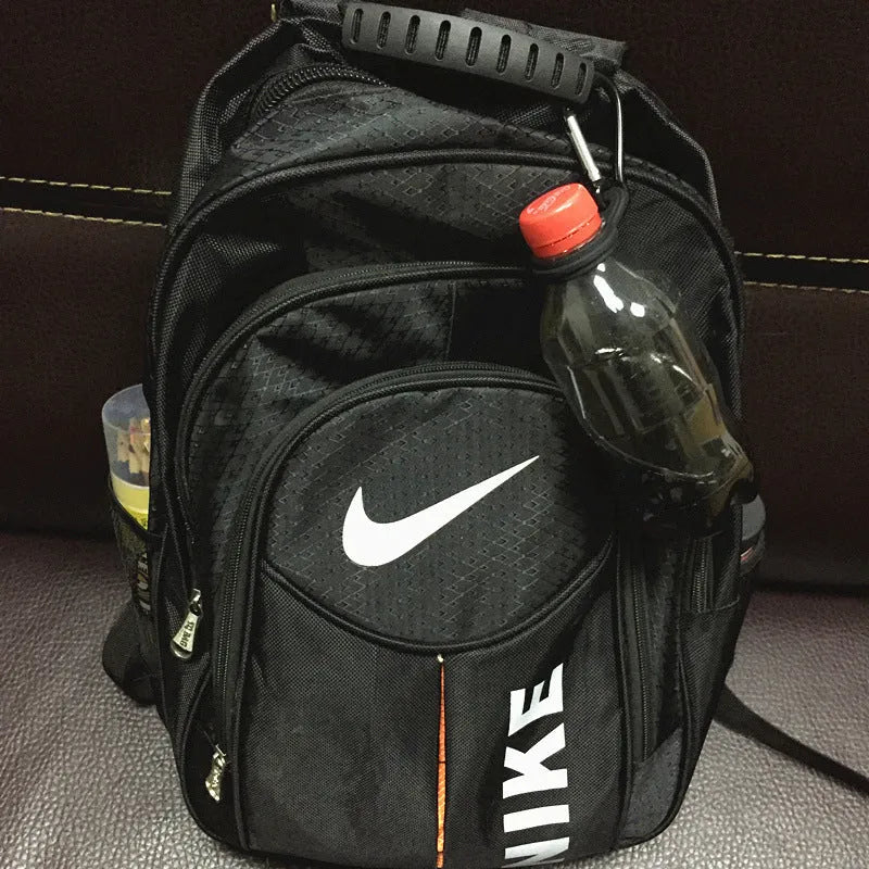 Outdoor travel water bottle hanging buckle in silicone, 55x37mm, shown on backpack strap