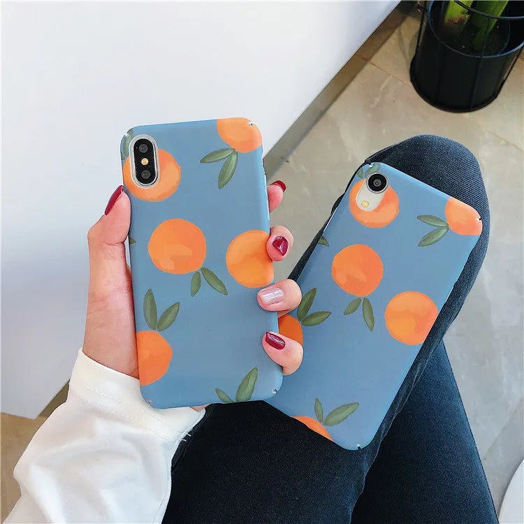 Plastic iPhone case with retro orange fruit and water design on blue background.