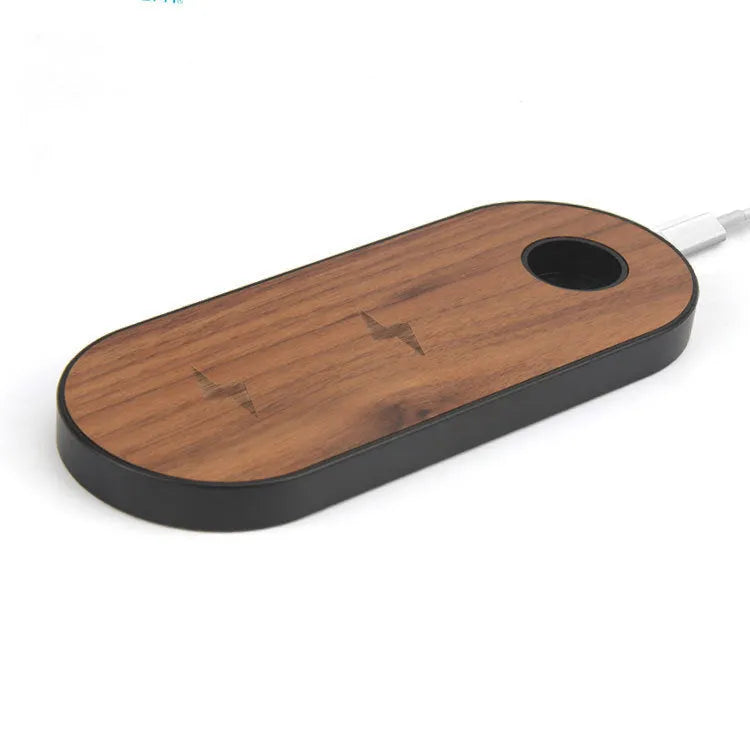 Wooden wireless charger with bamboo base and natural wood edging on desk surface