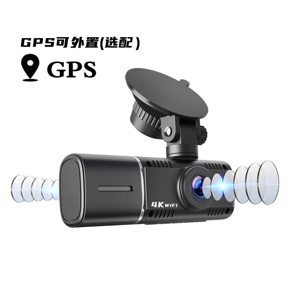 Black dual-lens dashboard camera with 1.5-inch screen mounted on car windscreen suction stand.