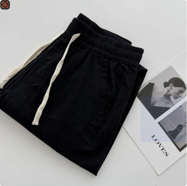 Men's loose straight leg casual trousers with drawstring waist in beige, black, green, grey, and navy blue colours