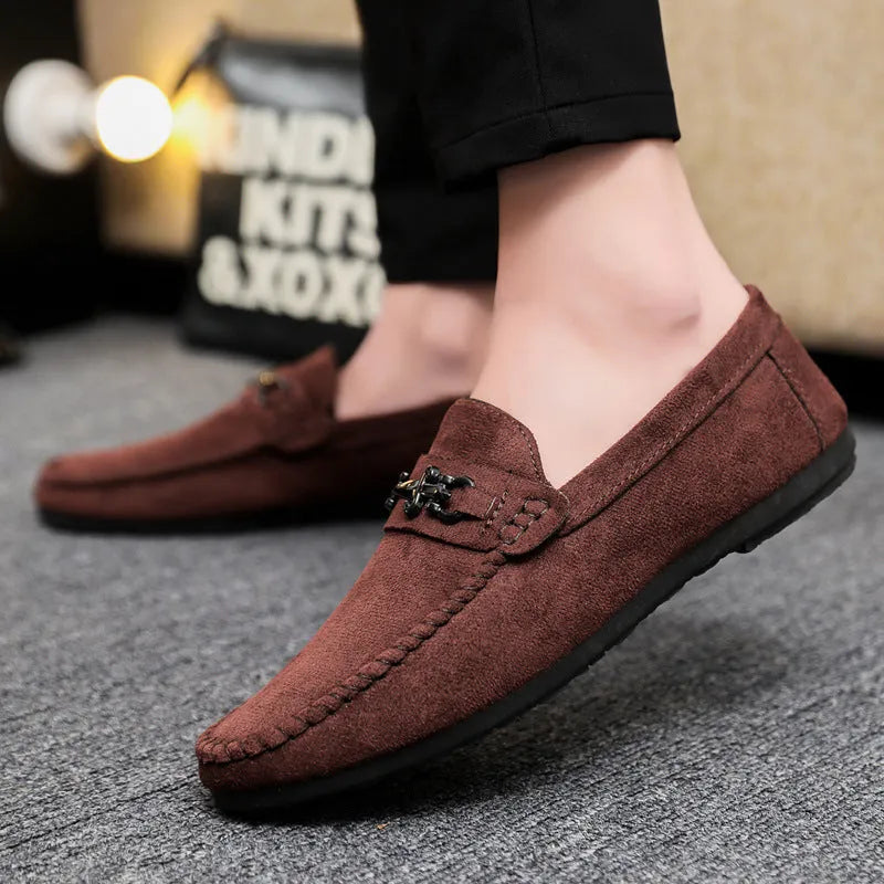 Men's black waterproof slip-on loafers with artificial PU leather upper and rubber sole.