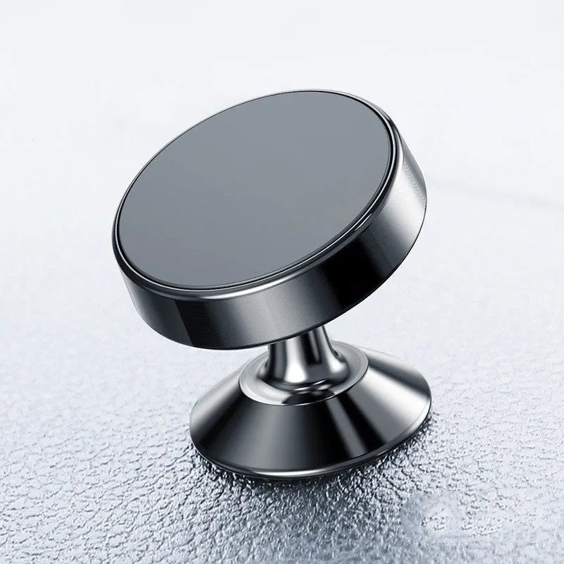 Aluminium alloy magnetic car phone holder in black, gold, or silver with paste or snap mounting.