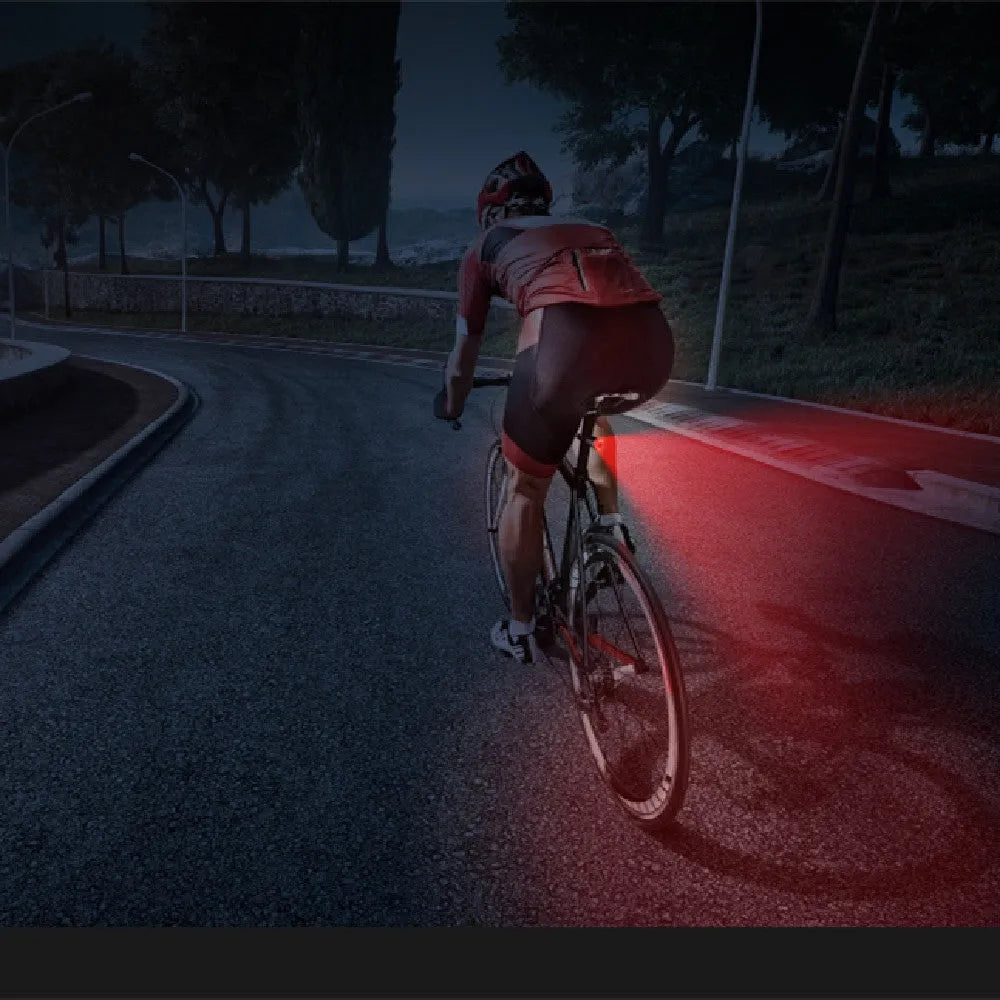 Black aluminium smart bicycle taillight with brake sensor and USB charging port.