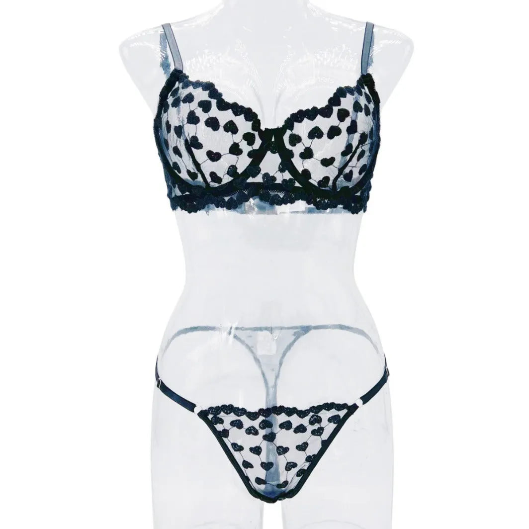 Women's black mesh two-piece suit set with top and trousers for special occasions.