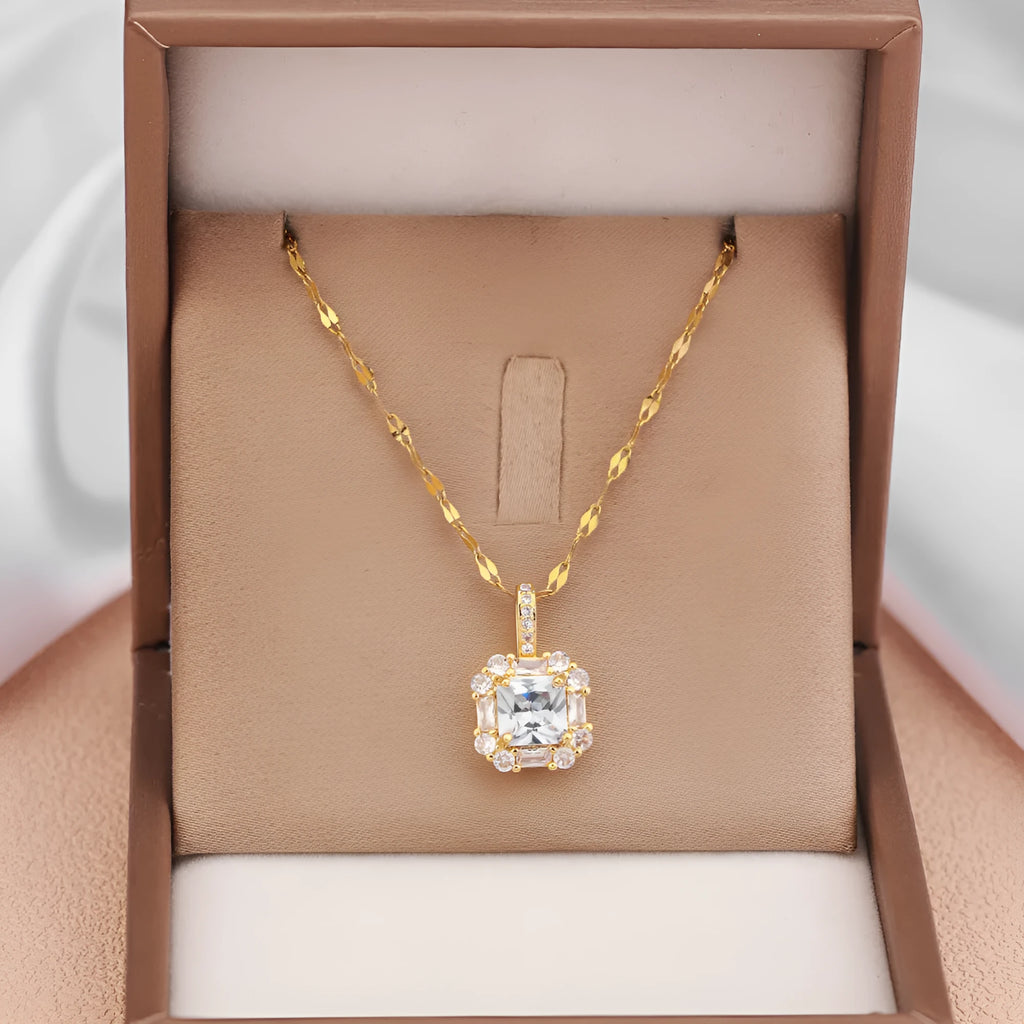 Gold geometric quadrilateral pendant with mixed gem inlays on titanium steel water wave chain necklace