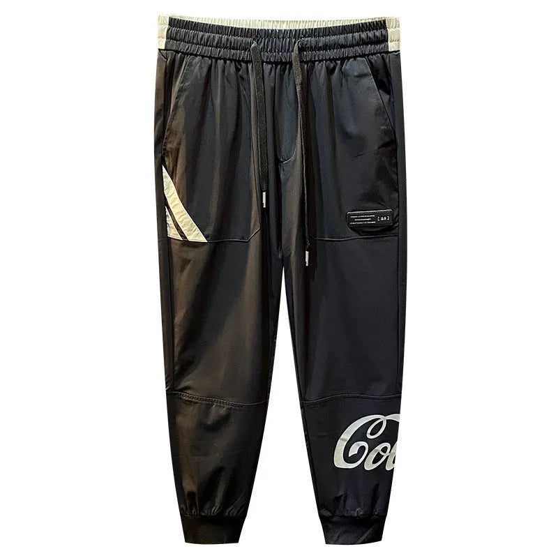 Black men's cropped casual trousers with ankle banding made from ultra-thin ice silk and cotton.