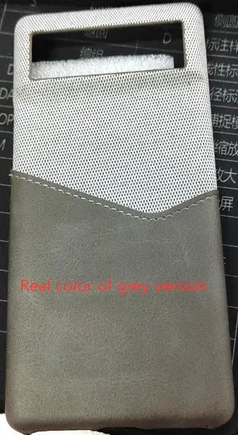 Google Pixel leather phone case in solid colours on a table.