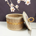 Hand-made brown rattan storage basket for snacks, cosmetics and sundries, available in 20cm and 23cm sizes.