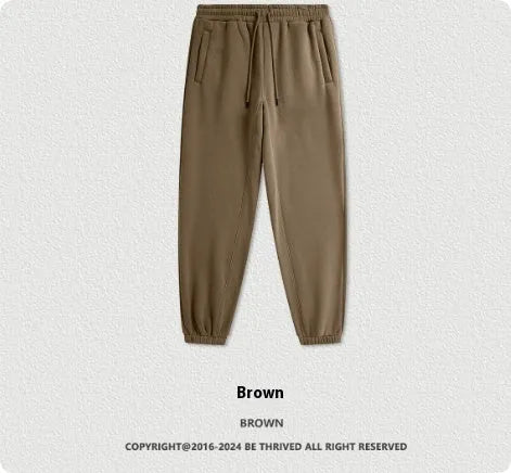 Men's solid colour cotton velvet sweatpants with ankle banding in a mid waist design