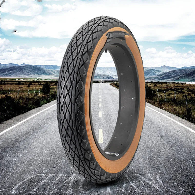 Brown-edged 20x4.0 inch rubber replacement tyre for snowmobiles and electric beach carts.