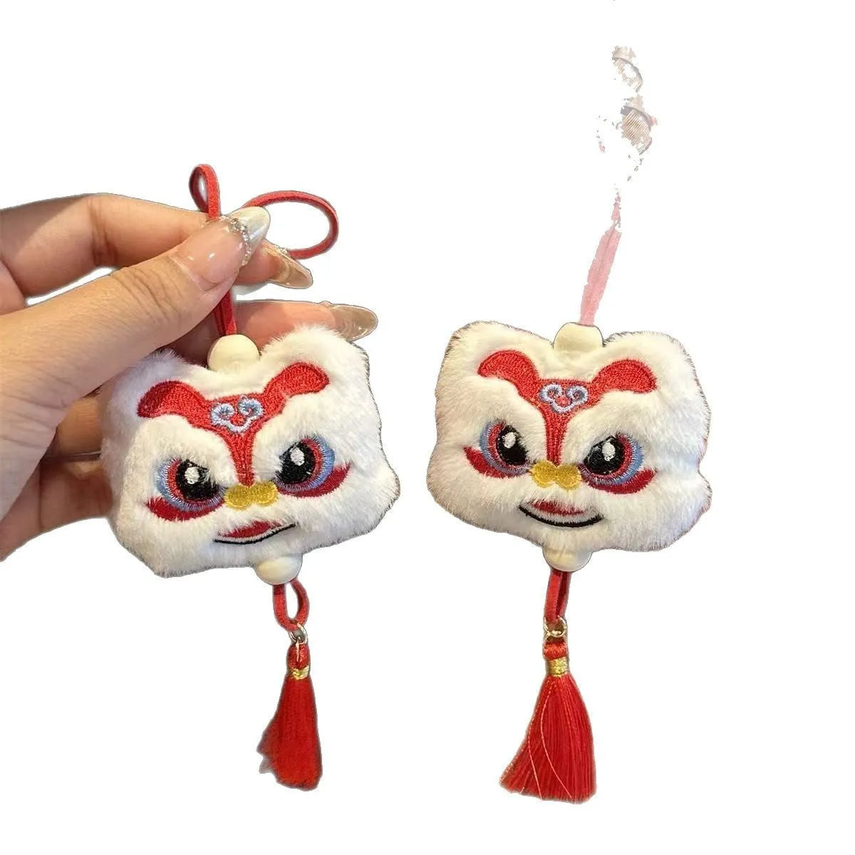 Blue Chinese style plush lion keychain ornament with star stone details and tassel
