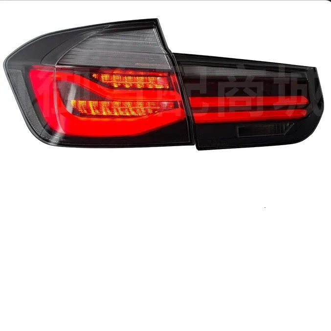 Modified streamer design LED tail light assembly for BMW 3 Series, shown in red and black smoke finishes.