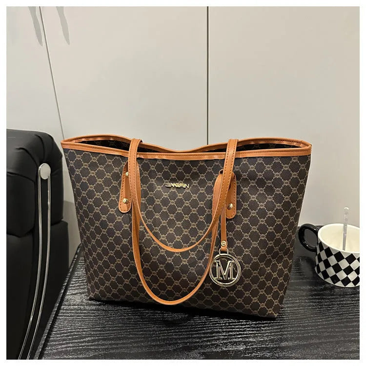 PU leather shoulder bag with adjustable strap in street trend style showing black colour option