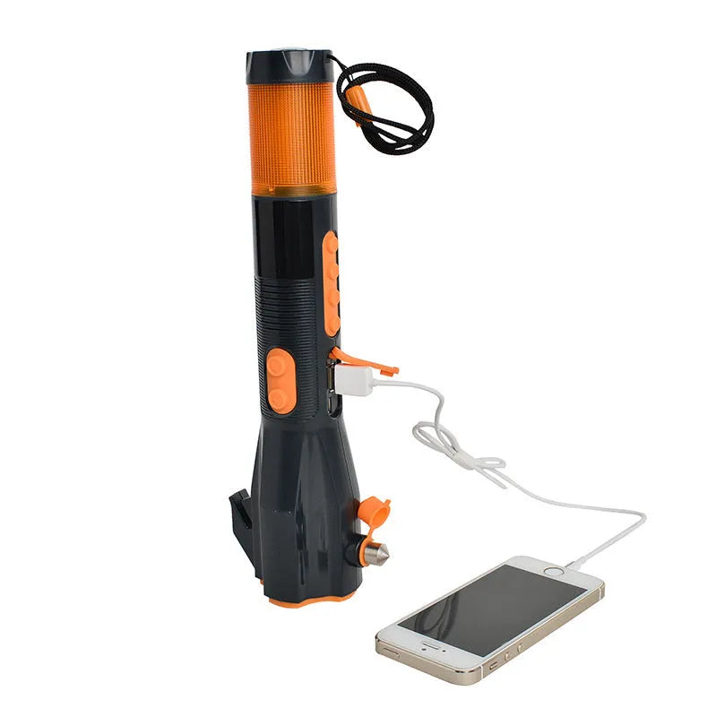 Orange and grey car safety hammer with window breaker, seat belt cutter, LED light, and AM/FM radio