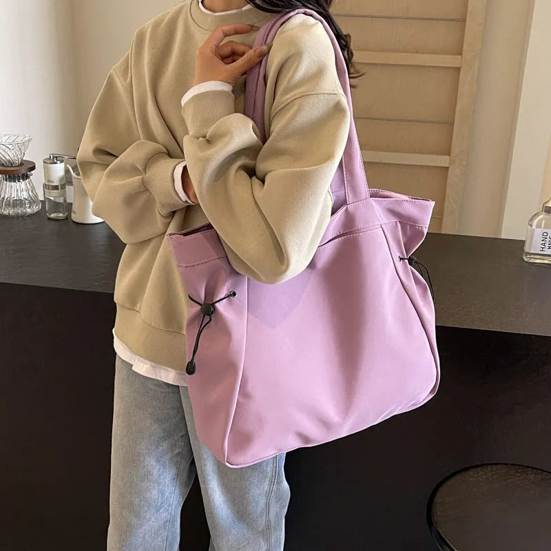 Soft foldable Oxford cloth tote bag in street trend style, shown in multiple colour options.