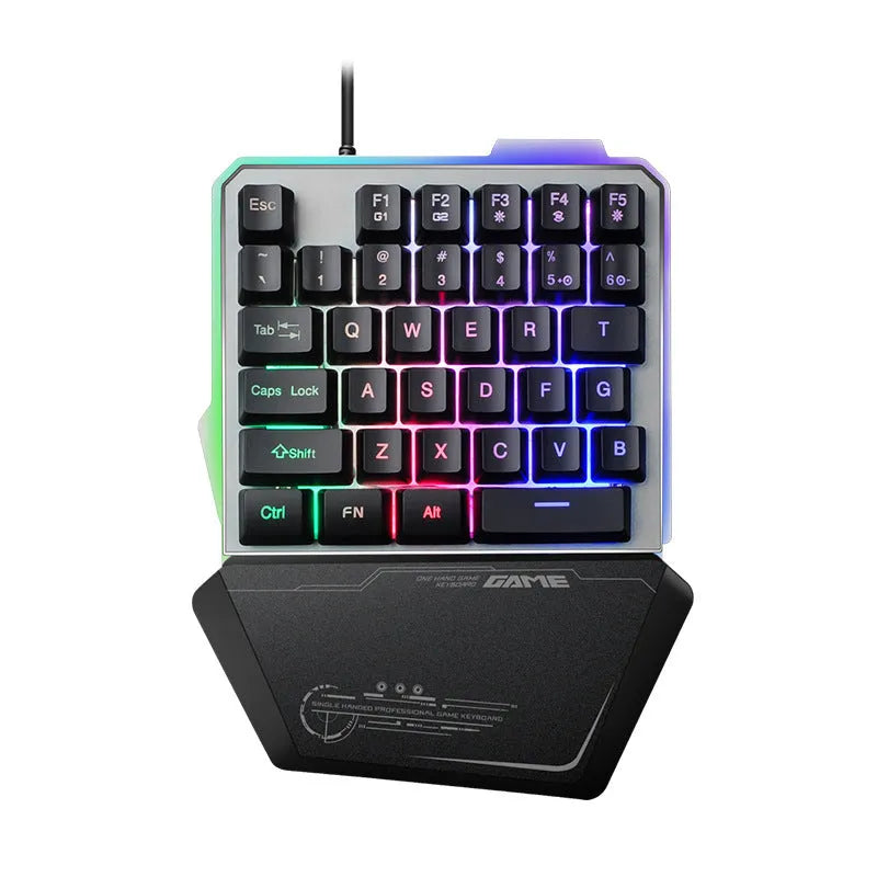 Black G40 Flow one-handed mechanical keyboard with RGB backlit keys on a desk