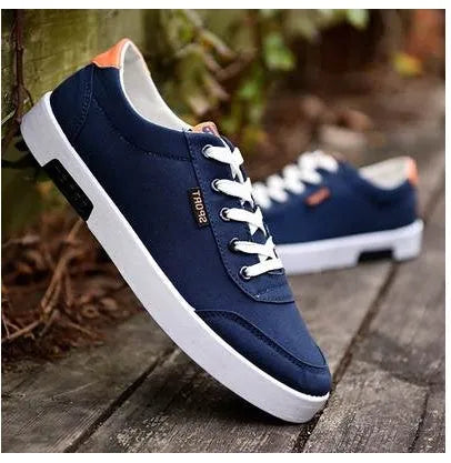 Men's Korean-style low-top canvas shoes, lace-up closure, rubber sole, plain pattern with car suture detail, available in sizes 39-44