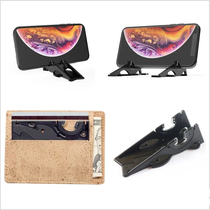 Black plastic card type mobile phone holder with a lazy bracket on a wooden desk.