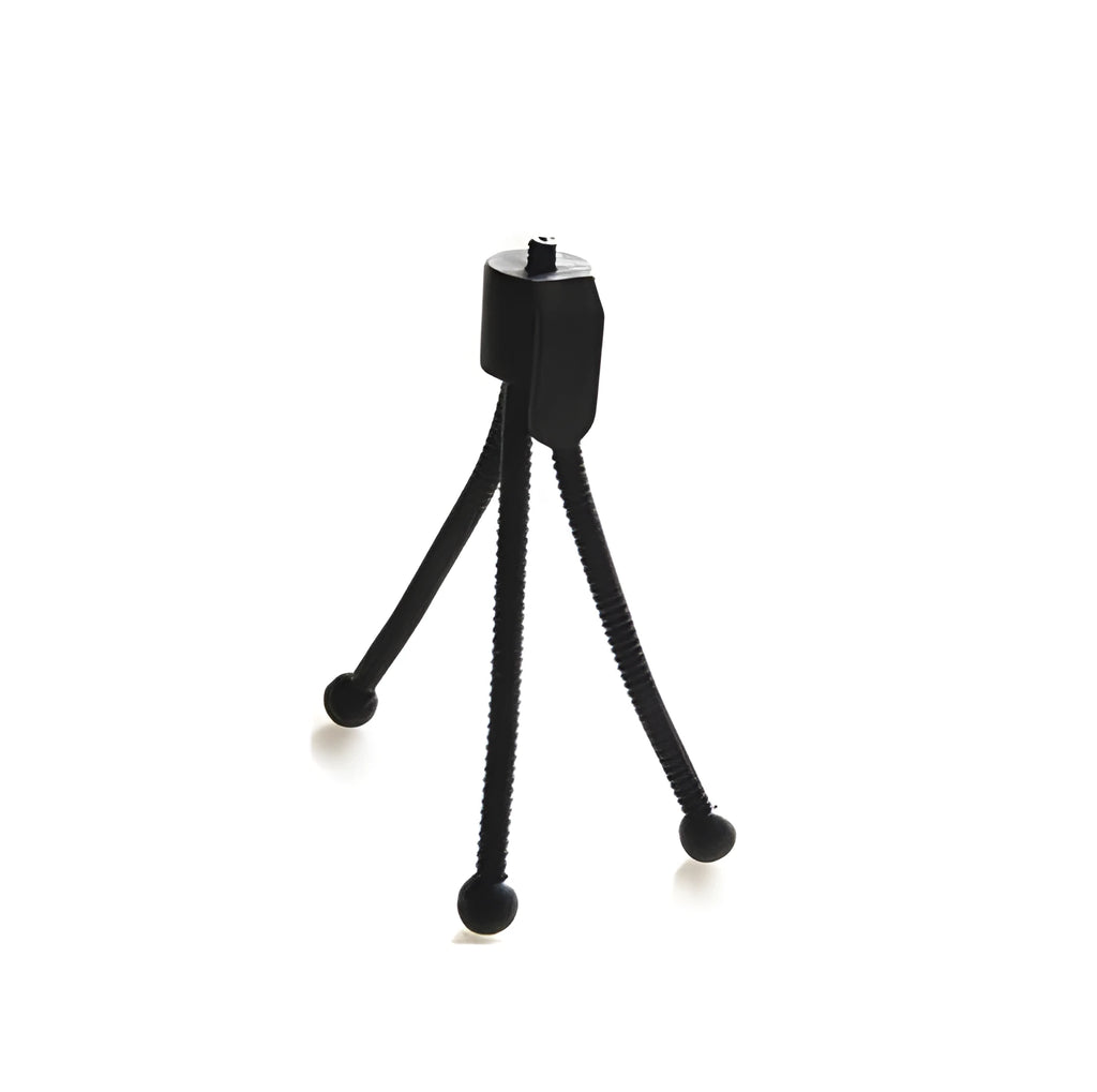 Compact black iron mini tripod with ball head, folded next to an iPhone for scale.