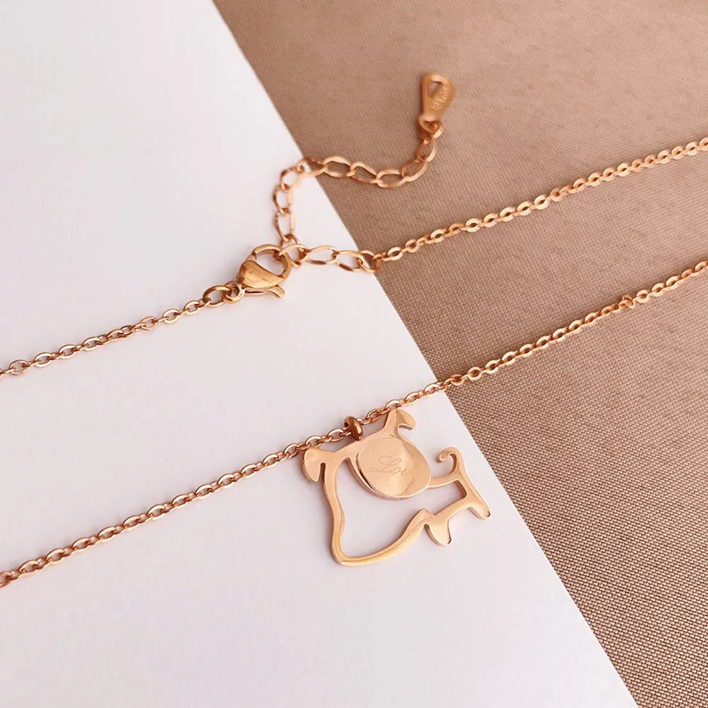 Rose gold titanium steel clavicle chain necklace with geometric line design on white background