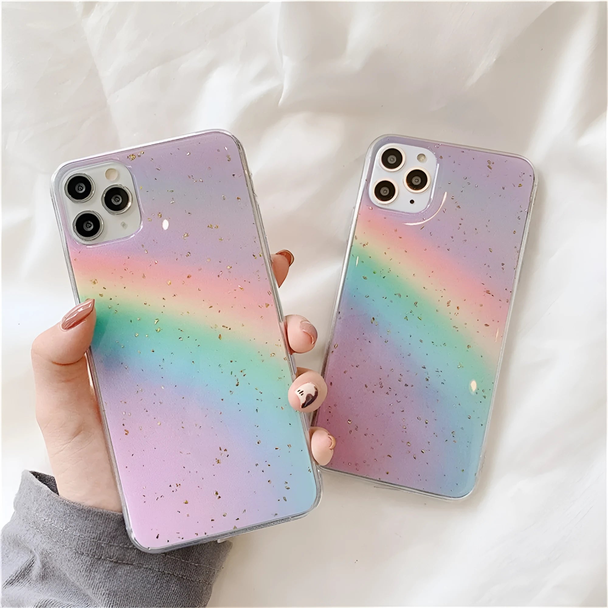 Rainbow gradient coloured TPU protective case for iPhone on a white background.