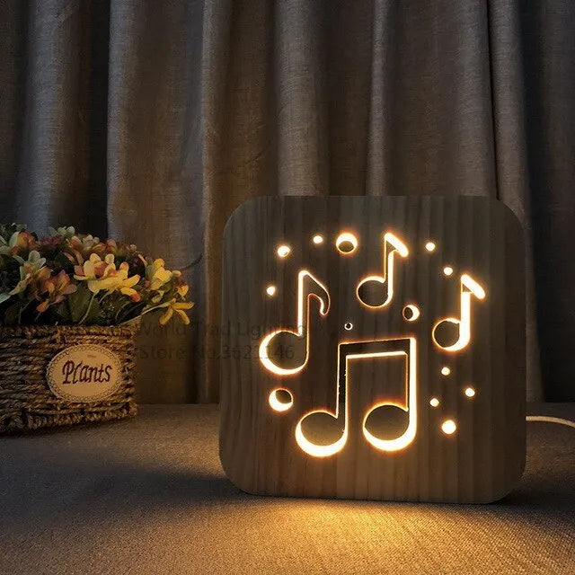 Square pine wood USB LED lamp emitting warm white 3D pattern light on a dark surface.