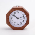 Polygonal beech wood luminous alarm clock with hexagonal shape in brown white finish on nightstand