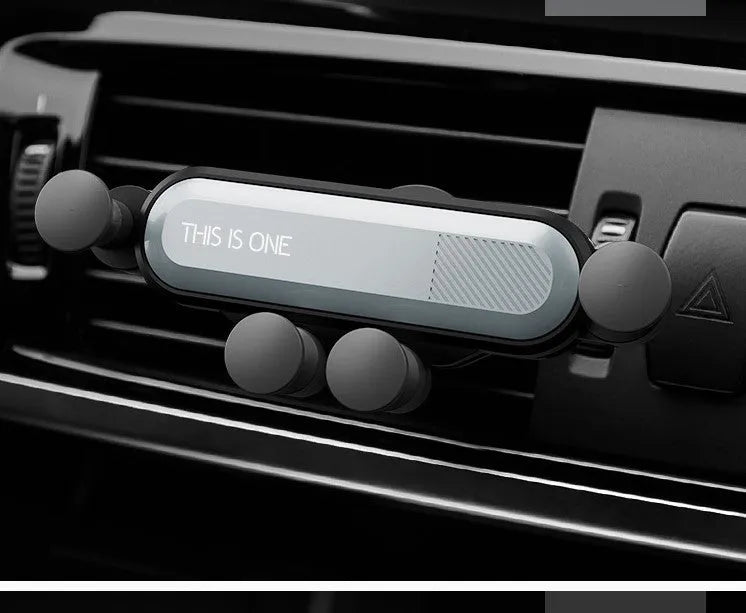 Universal car phone navigation holder clipped onto a vehicle air vent, available in multiple colours.