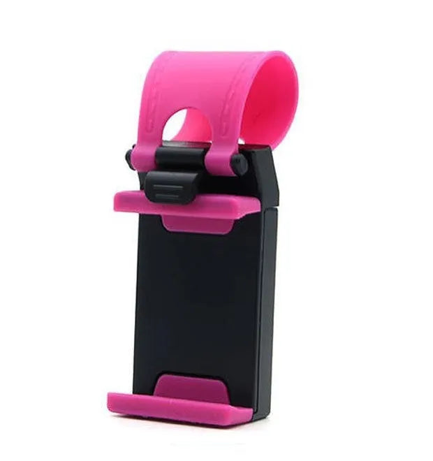 Black universal steering wheel phone holder clip mounted on a car steering wheel, holding a smartphone.