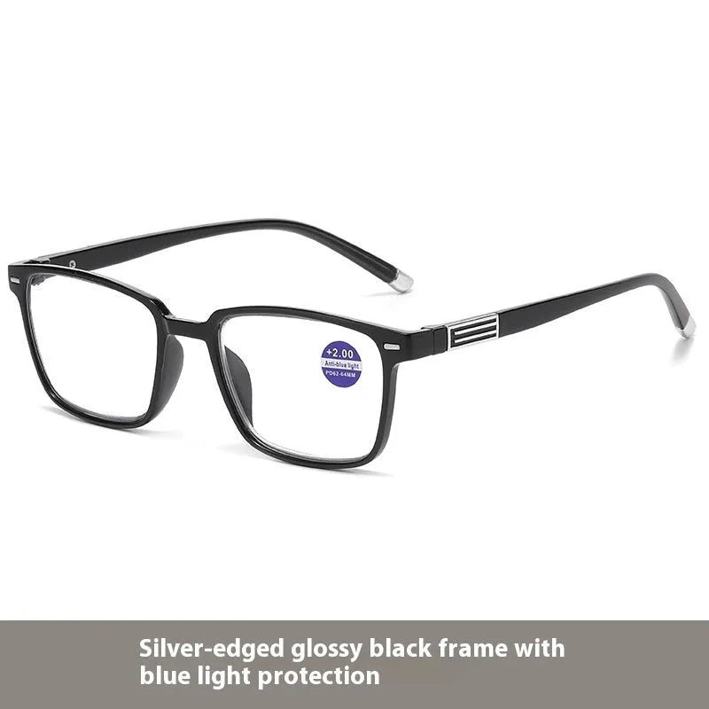 Multifocal blue light reading glasses with photochromic lenses in a black and silver frame style.