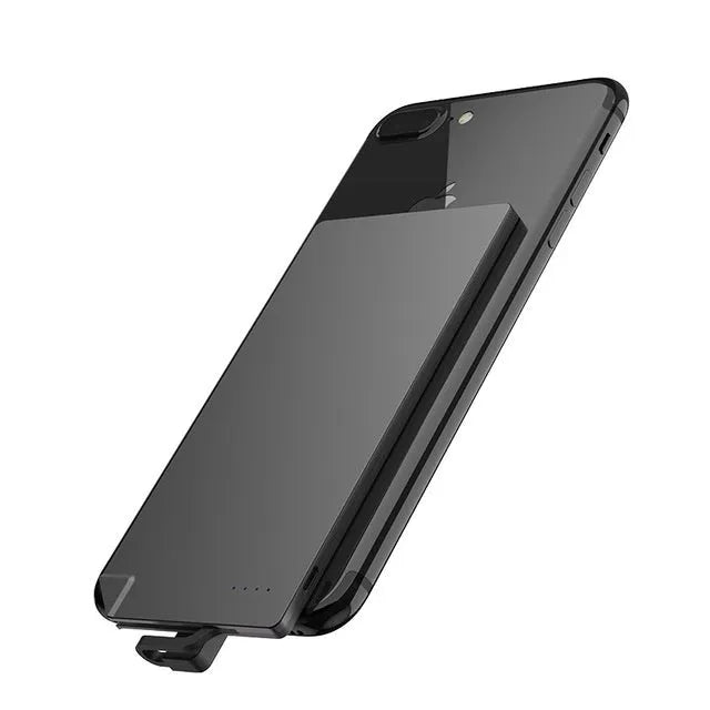 Silver ultra-thin 4mm graphene power bank next to a mobile phone showing its slim profile.