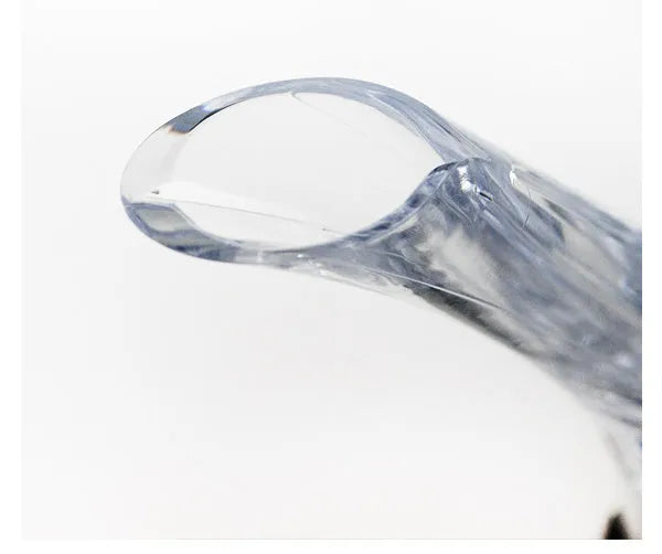 Compact clear acrylic wine aerator with a stainless steel filter, measuring 16cm long.