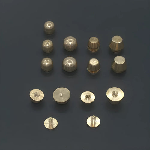 Brass decorative buckle foot nails in round and bucket head shapes, sizes 10x6mm and 12x7mm.