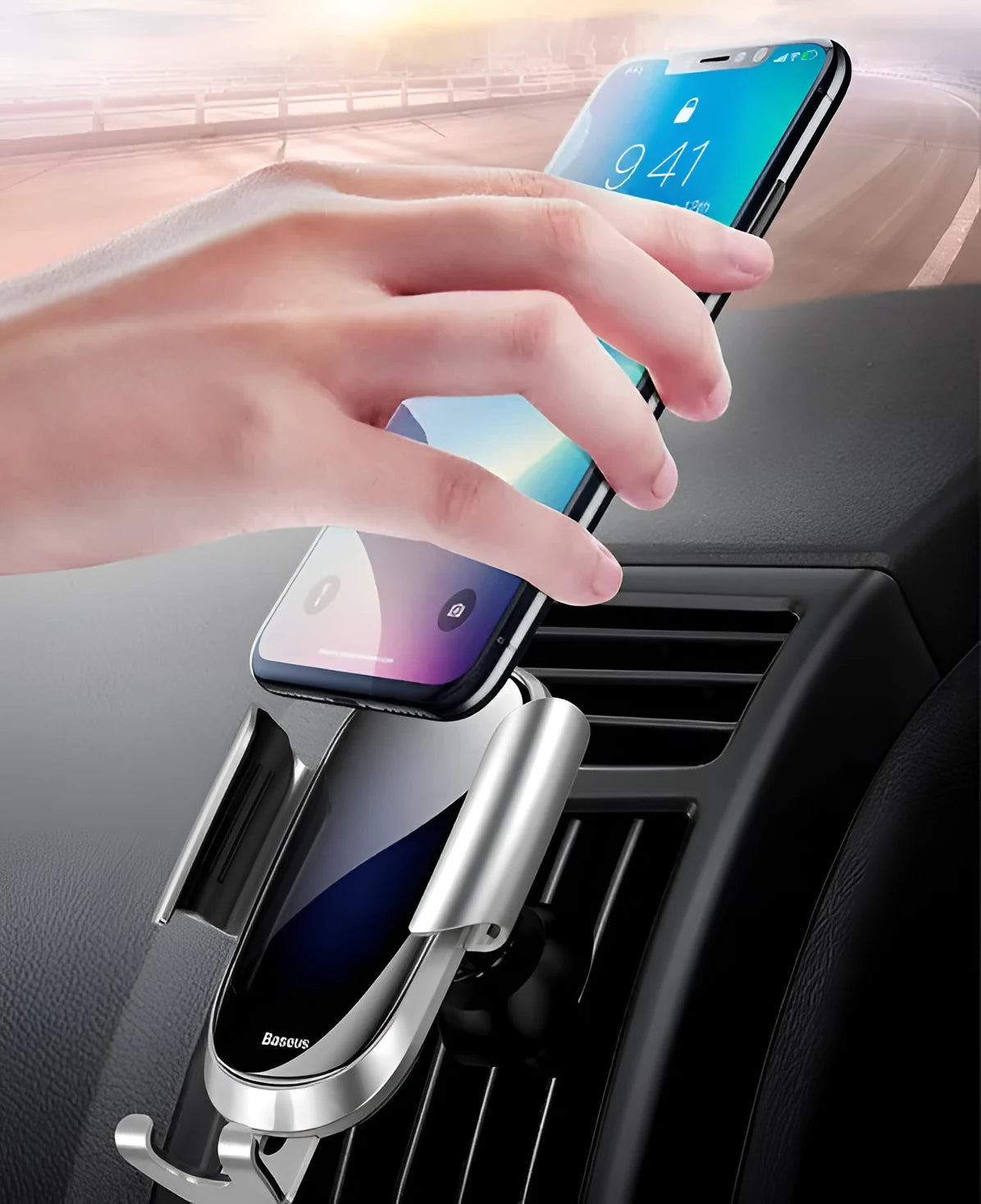 Universal car phone bracket in black mounted on a vehicle dashboard
