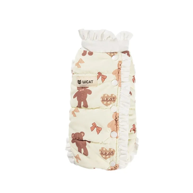 Cream fleece pet jumpsuit with bear print and white ruffles, four-legged design on small dog