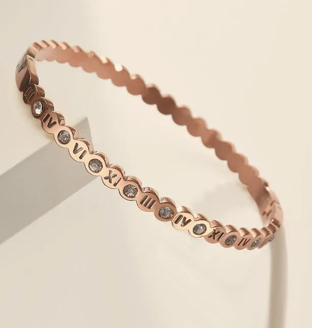 Titanium steel Korean style bracelet with numeric elements in gold, rose gold, or steel colour.