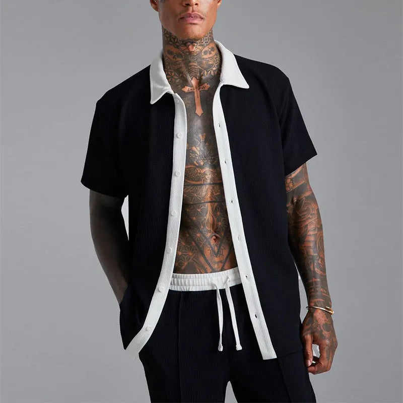 Men's two-piece suit in polyester cloth with printed design, available in black or white