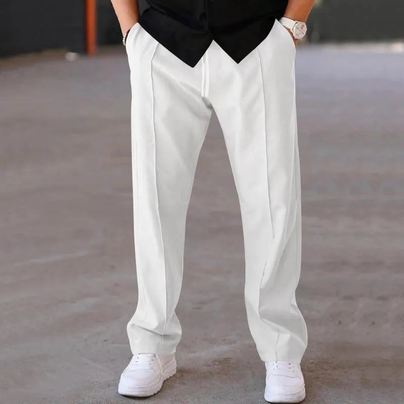 Men's loose straight trousers in waffle polyester with drawstring, available in multiple colours including black and light grey