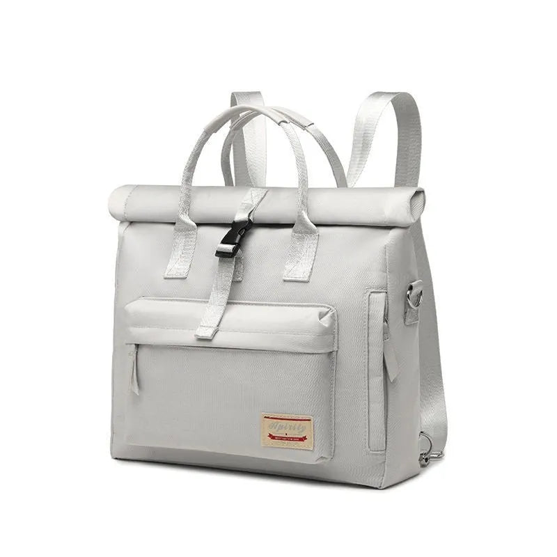 Shockproof waterproof nylon laptop bag in black, shown in medium and large sizes for 14 inch and 15.6 inch laptops.