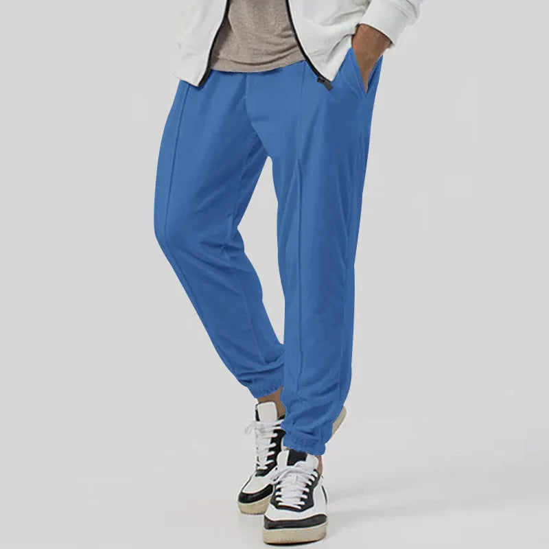 Men's grey cotton blend straight-leg track sweatpants with a tapered fit and elasticated waist.