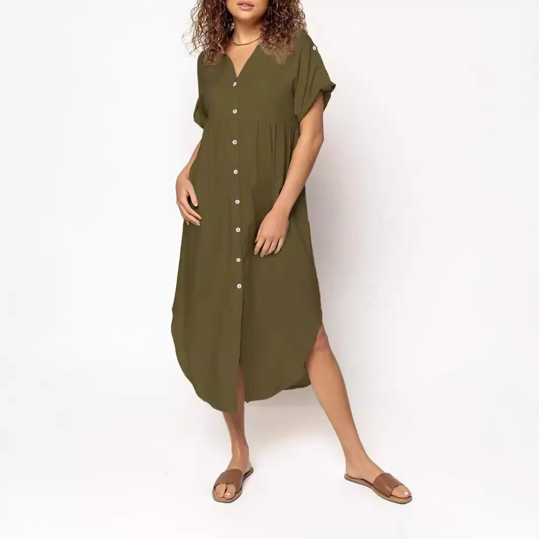 Women's loose fit casual dress with button front and mid-length skirt in solid colour.