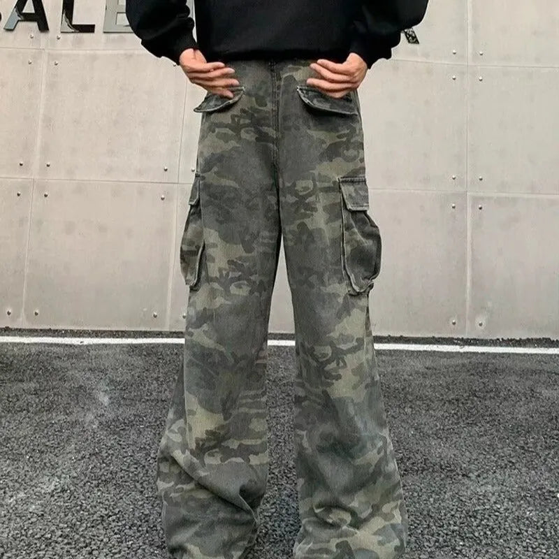 Men's washed camouflage print cargo trousers with multiple pockets and a mid waist design.
