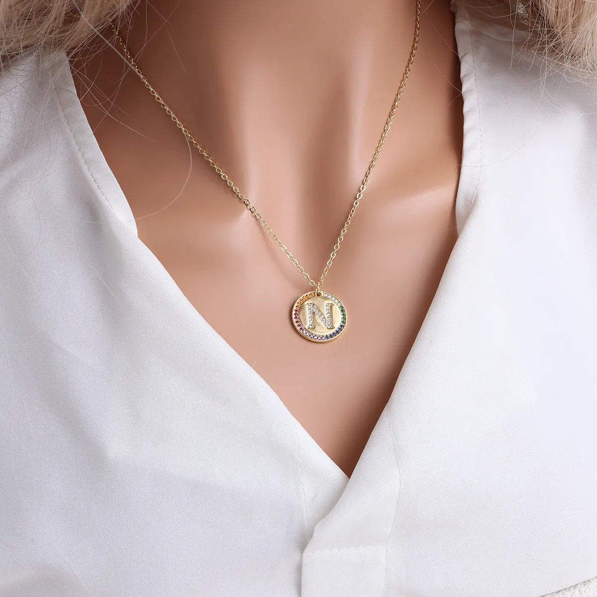 Gold English letter round pendant necklace with colourful crystals on clavicle length chain