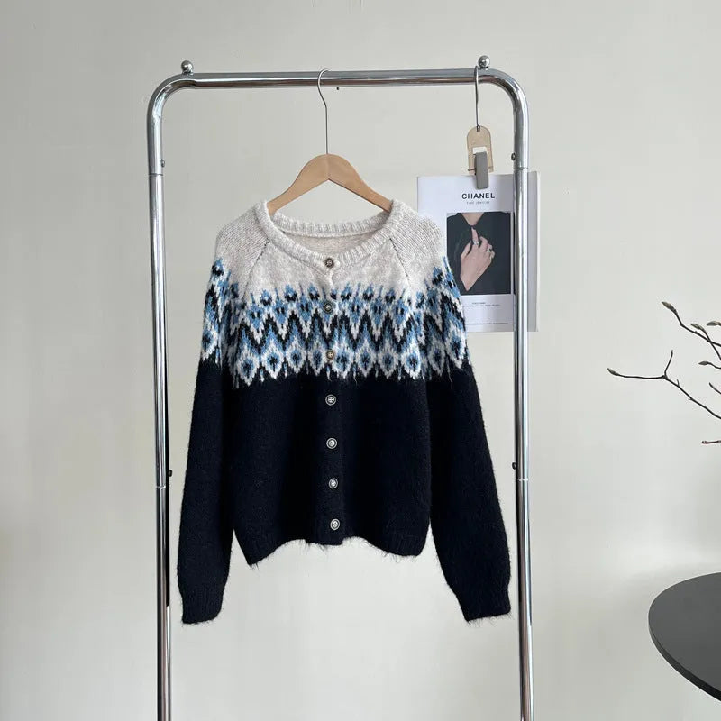 Women's beige jacquard knit sweater coat with loose fit and long sleeves.