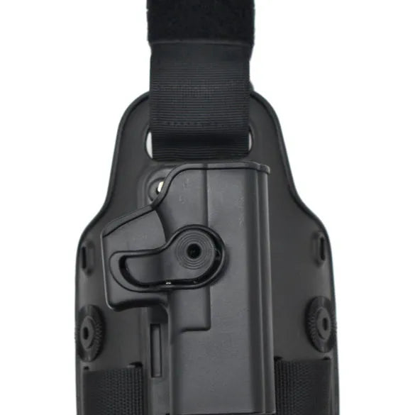 Green plastic tactical leg holster bag attached via waist plate, shown on a leg.