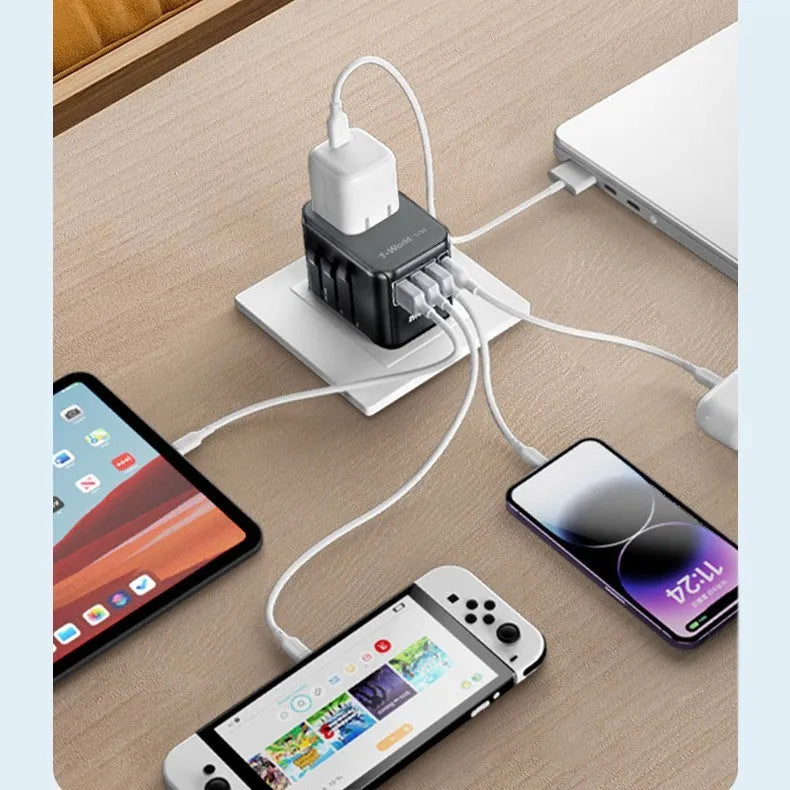 Black universal travel adapter UA12 with four-bit multi country converter, 70x64x48mm PC housing