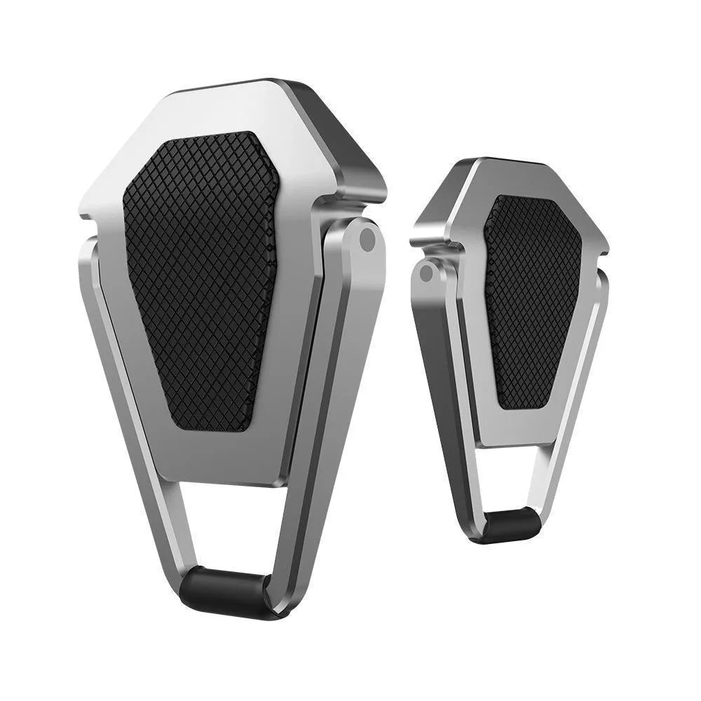 Small silver aluminium foldable computer bracket with 3M adhesive strips for laptop mounting