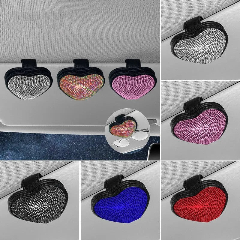 Black diamond-encrusted PU leather clip holding sunglasses and a ticket on a car sun visor.
