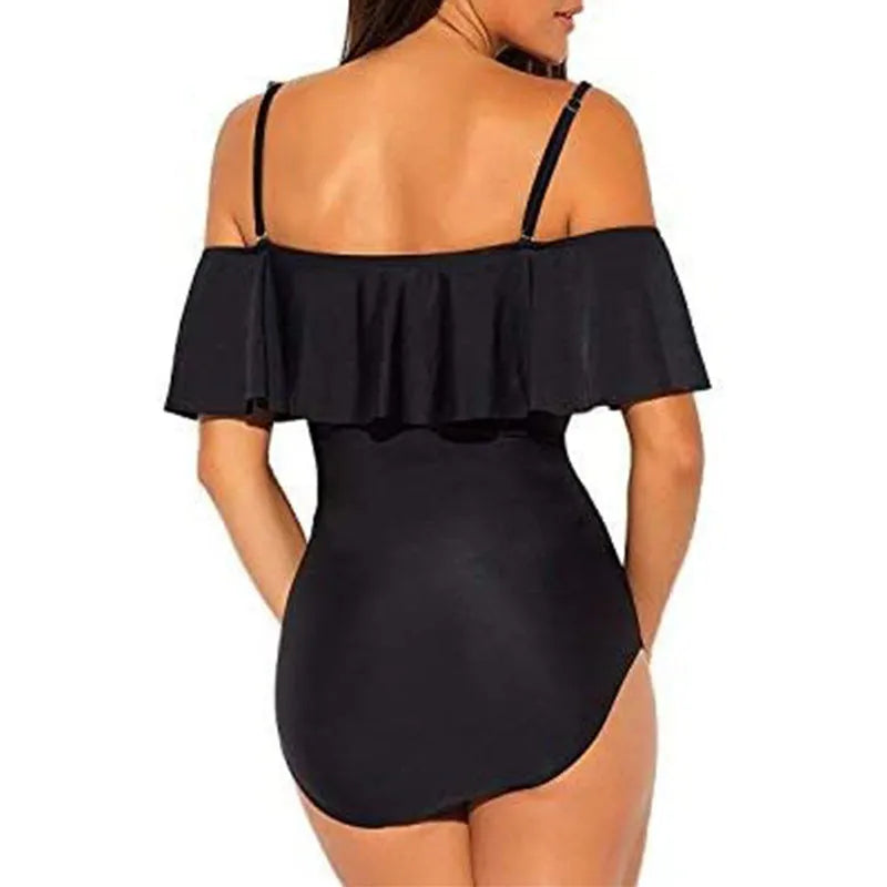 Black one-piece swimsuit with cut-out sides and ruffled shoulder straps